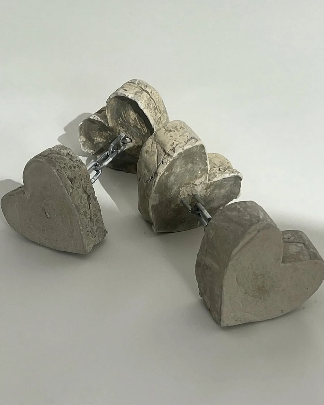 heart-shaped concrete dumbbells 